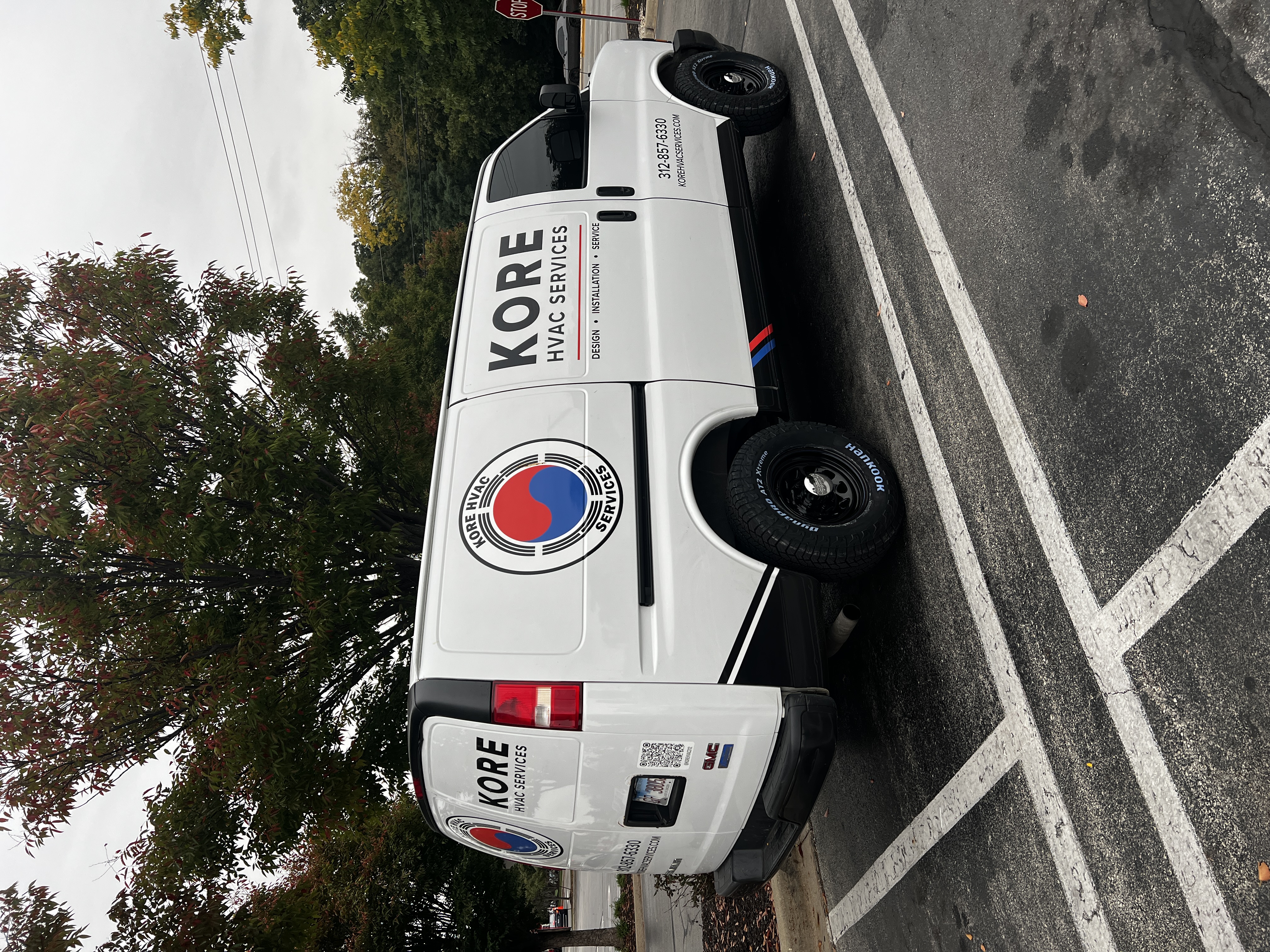 White Kore HVAC Services van with red and blue branding